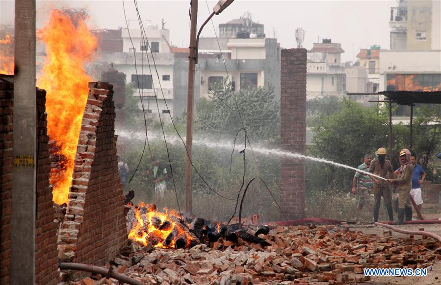 KASHMIR-JAMMU-TIMBER GODOWN-FIRE