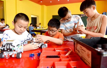 Children participate in various activities during summer vacation in China