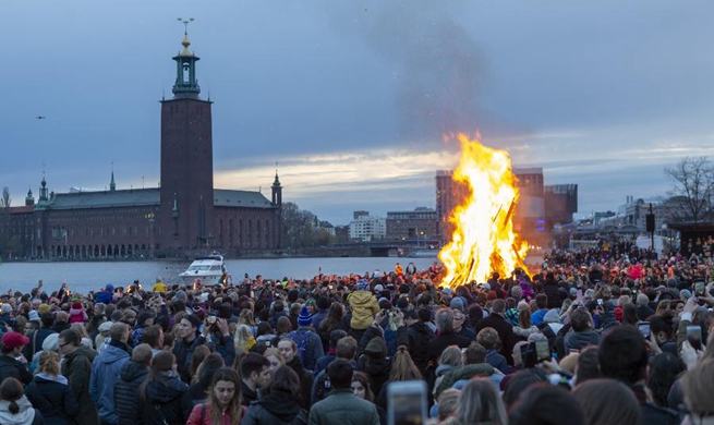 Swedes gather around bonfire to celebrate Valborg in Stockholm