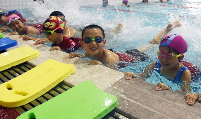 Children participate in various activities during summer vacation in China