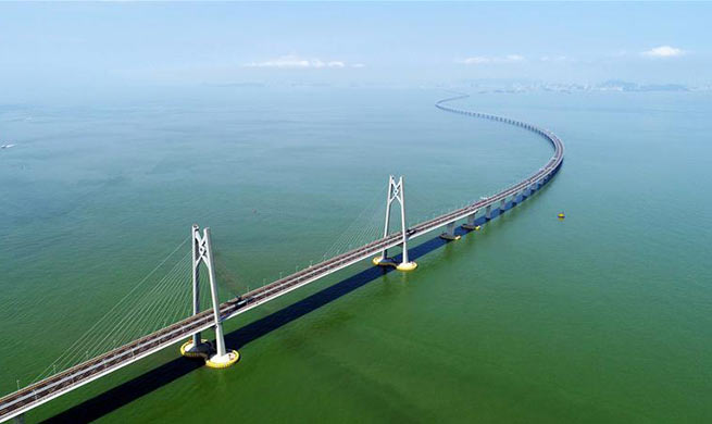 Xinhua Headlines: World's longest cross-sea bridge opens, integrating China's Greater Bay Area